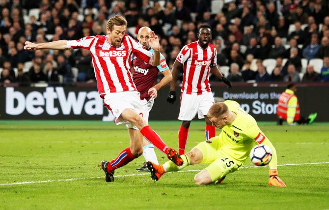 Stoke City's Peter Crouch scores their first goal