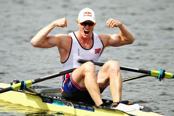 Norway's Kjetil Borch celebrates winning in rowing final of the Men's Single Sculls event at Strathclyde Country Park in Glasgow on August 5