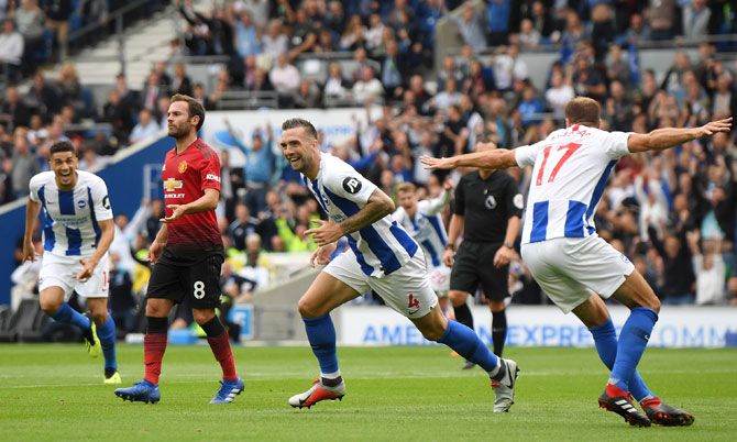Brighton and Hove Albion's Shane Duffy celebrates after scoring his team's second goal against Manchester United during their English Premier League match at American Express Community Stadium in Brighton, United Kingdom, on Sunday
