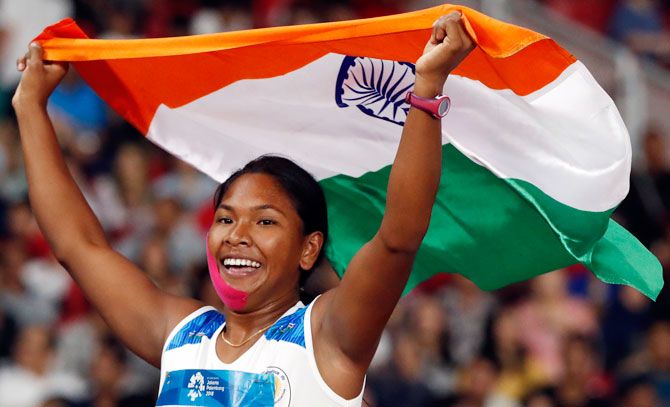 Swapna Barman of India celebrates after winning the Women's Heptathlon on Wednesday