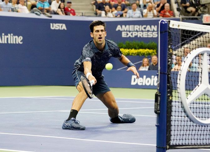 Serbia's Novak Djokovic hits a return against USA's Tennys Sandgren in a second round match