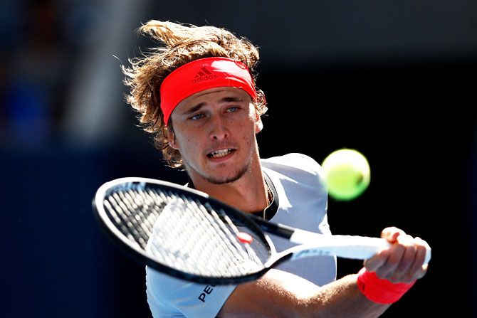 Germany's Alexander Zverev plays a return against France's Nicolas Mahut in their 2nd round match