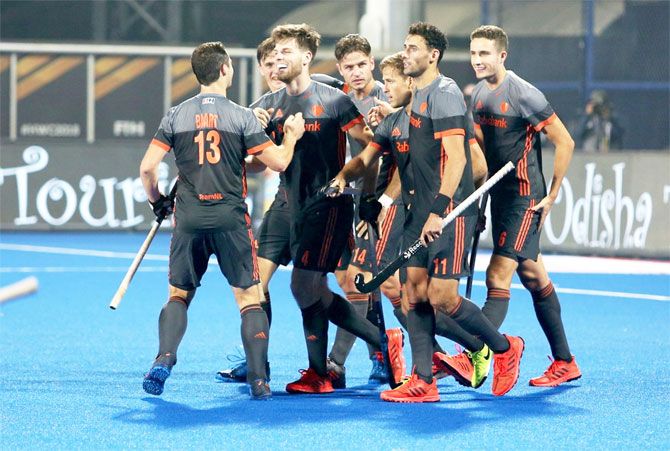 Netherlands' players celebrate a goal against Canada in their cross over match at the hockey World Cup in Bhubaneswar on Tuesday