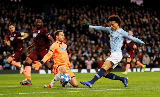 Manchester City's Leroy Sane scores their second goal past Hoffenheim's Oliver Baumann during their Group F match at Etihad Stadium in Manchester