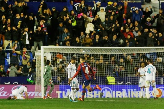 Real Madrid’s Casemiro and Marcello are stunned after Levante’s second goal.