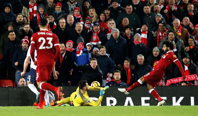 Liverpool's Mohamed Salah scores their second goal