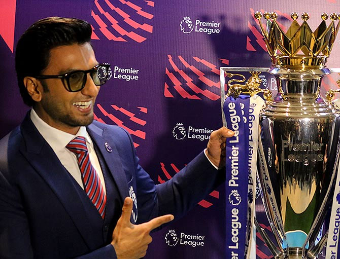 Brand Ambassador for EPL in Indiia, Ranveer Singh poses with Premier League Trophy at the event on Friday