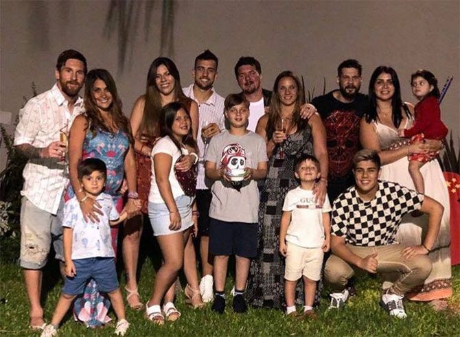 FC Barcelona's superstar Lionel Messi (left) joined his family his family in wishing his followers 'Feliz 2018!!'