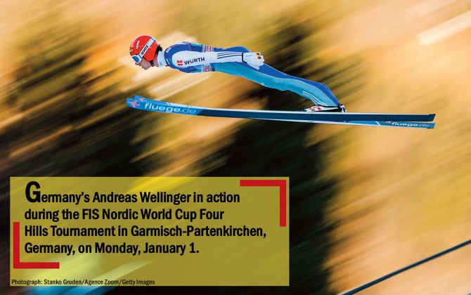 Germany’s Andreas Wellinger in action during the FIS Nordic World Cup Four Hills Tournament in Garmisch-Partenkirchen, Germany, on Monday, January 1