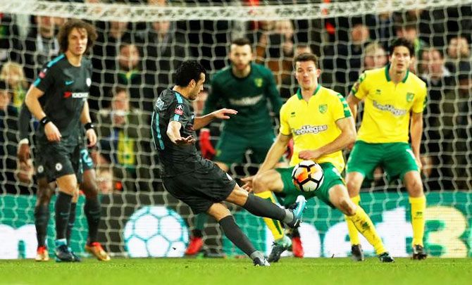 Chelsea's Pedro shoots at goal durng their match against Norwich City at Carrow Road at Norwich