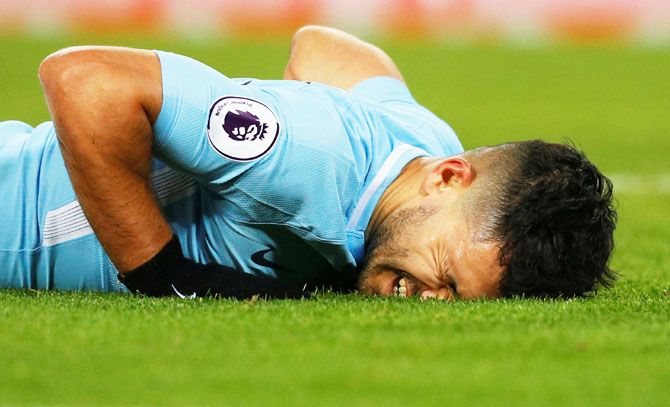 Manchester City's Sergio Aguero reacts after missing a chance to score