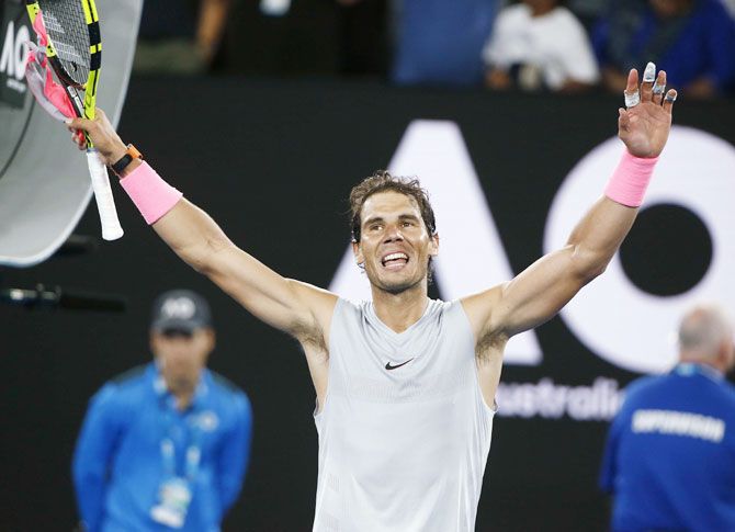 Top seed, Spain's Nadal celebrates after winning his match against Dominican Republic's Victor Estrella Burgos