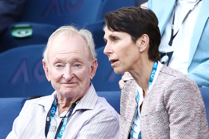 Australian tennis legend Rod Laver (right) enjoying the proceedings during the thrilling encounter