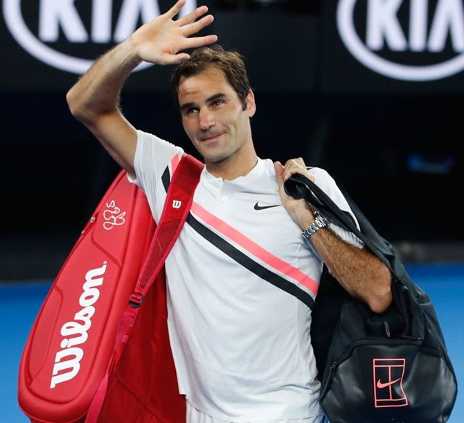 Switzerland's Roger Federer plays a forehand return in his semi-final against South Korea's Hyeon Chung