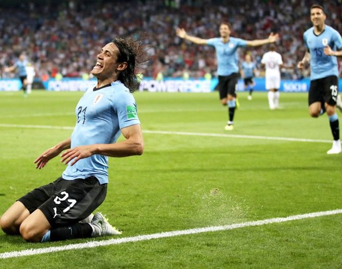 Edinson Cavani celebrates after putting Uruguay ahead in the World Cup Round of 16 match against Portugal. Photograph: Julian Finney/Getty Images