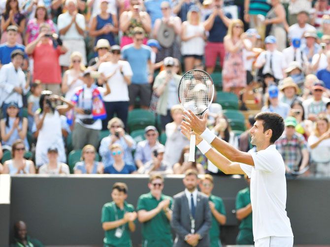 Serbia's Novak Djokovic celebrates winning his second round match against Argentina's Horacio Zeballos