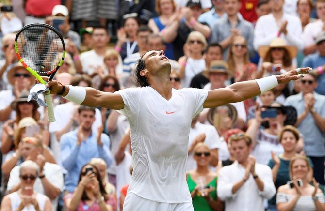 Spain's Rafael Nadal celebrates winning the second round match against Kazakhstan's Mikhail Kukushkin