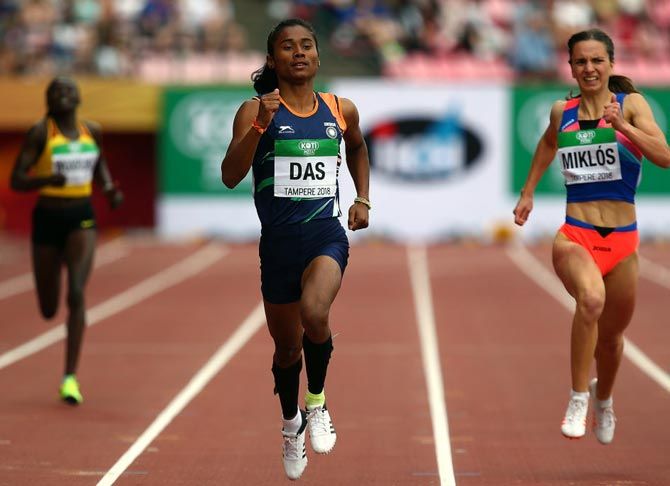 India's Hima Das finishes well ahead of the field in Heat 1 of the women's 400m semi-finals on Day 2 of the IAAF World Under-20 Championships in Tampere, Finland on Thursday