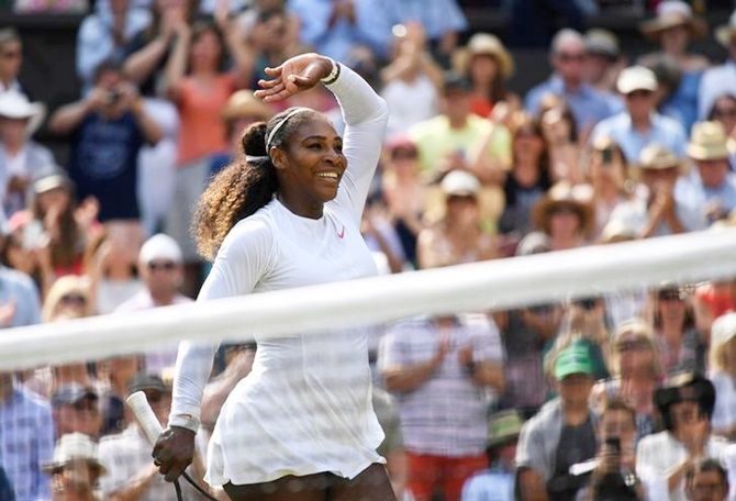 Serena Williams of the United States celebrates beating Germany's Julia Goerges in the semi-finals of the Wimbledon Championships on Thursday