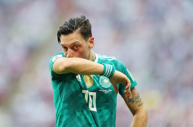 The most prominent German politician of Turkish origin said it would be difficult for the head of the national soccer association to stay in the role, adding that Ozil's departure would only be welcomed by those who opposed diversity.