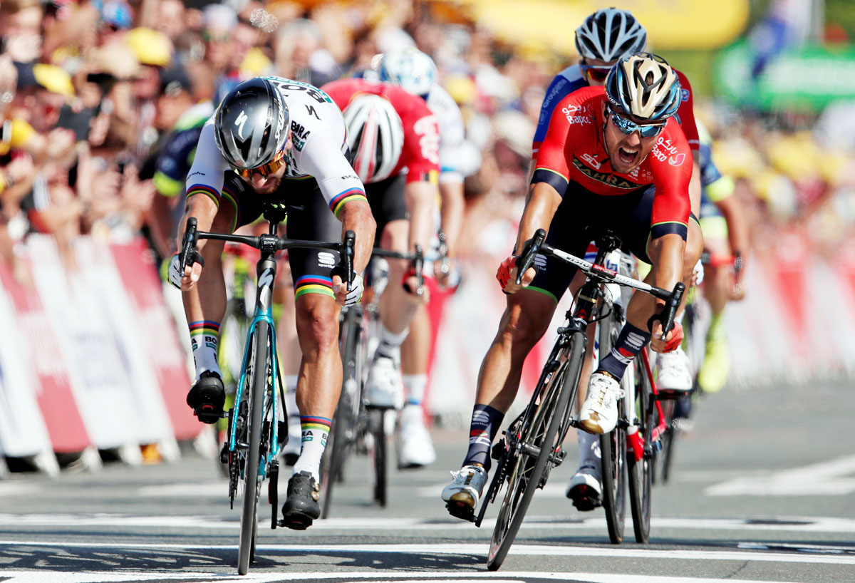 BORA-Hansgrohe rider Peter Sagan of Slovakia and Bahrain-Merida rider Sonny Colbrelli of Italy battle it out at the 182.5-km Stage 2 from Mouilleron-Saint-Germain to La Roche-sur-Yon on July 8