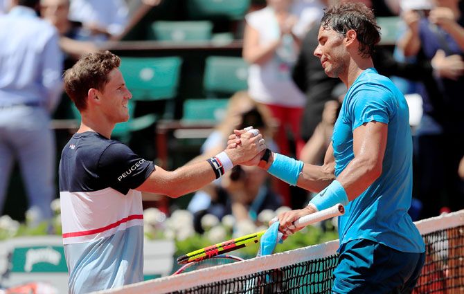 Spain's Rafael Nadal is congratulated by Argentina's Diego Schwartzman after winning their quarter-final match