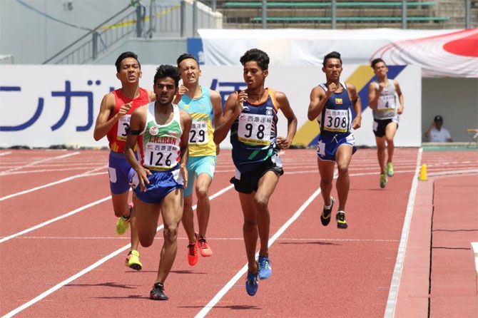 India's Anu Kumar edges Iran's Abdolrahim Dorzadeh to claim the 800 metres gold at the Asian Junior Athletics Championships in Japan on Saturday