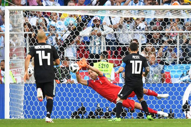 Iceland keeper Hannes Halldorsson saves a penalty from Argentina's Lionel Messi