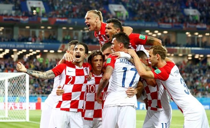 Croatia's Luka Modric celebrates with team mates after scoring their second goal 
