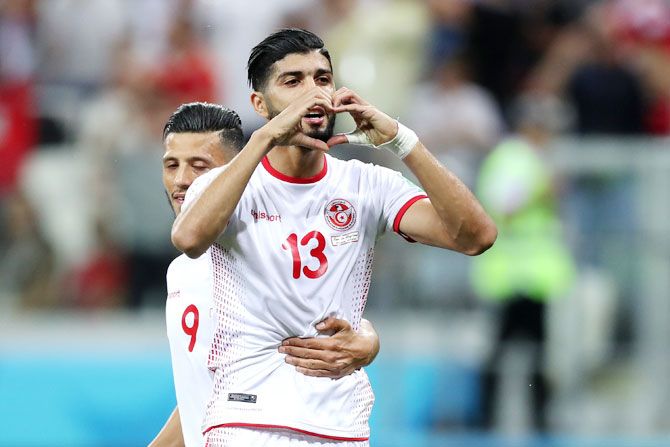 Tunisia's Ferjani Sassi celebrates after scoring his team's first goal against England during their Group G match