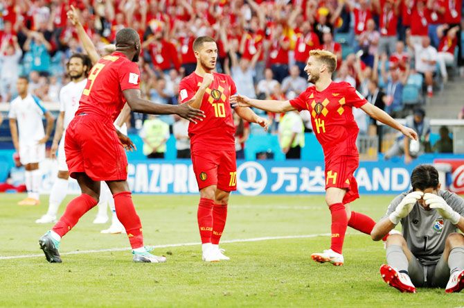 Belgium's Romelu Lukaku celebrates scoring their second goal with Eden Hazard and Dries Mertens 