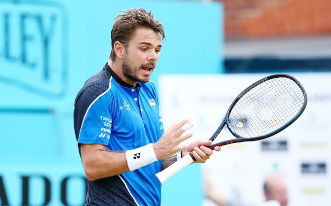 Switzerland's Stan Wawrinka reacts during his match against USA's Sam Querrey on day 3 of the Fever-Tree Championships at Queens Club in London on Wednesday