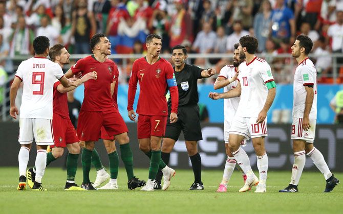 Portugal's Pepe, Cristiano Ronaldo clash with Iran's Karim Ansarifard