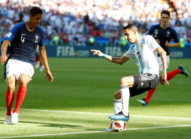 Argentina's Di Maria challenges France's Raphael Varane. The Albiceleste ended the tournament with a 64 percent possession average