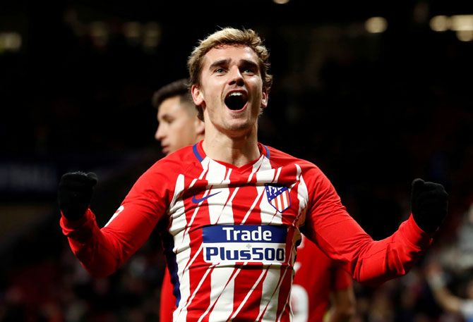 Atletico Madrid’s Antoine Griezmann celebrates after scoring their third goal to complete his hat-trick against Leganes on Wednesday