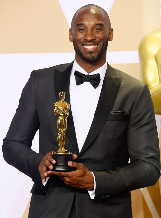 NBA star and filmmaker Kobe Bryant, winner of the Best Animated Short Film award for 'Dear Basketball,' poses in the press room during the 90th Annual Academy Awards at Hollywood & Highland Center in Hollywood, California, on March 4