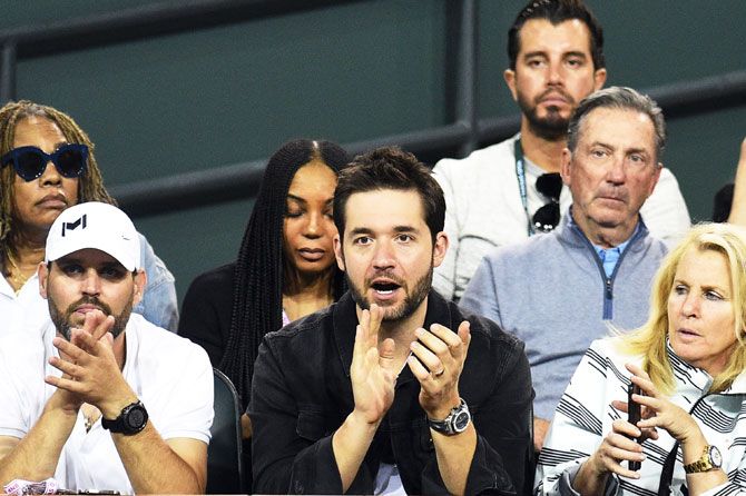 Alexis Ohanian, co-founder and executive chairman of the social news website Reddit, cheers on as his wife Serena Williams plays against Zarina Diyas