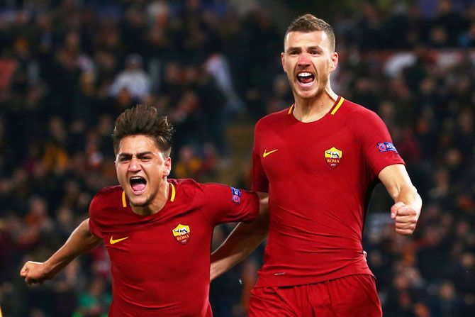 Roma's Edin Dzeko celebrates with Cengiz Under after scoring their first goal
