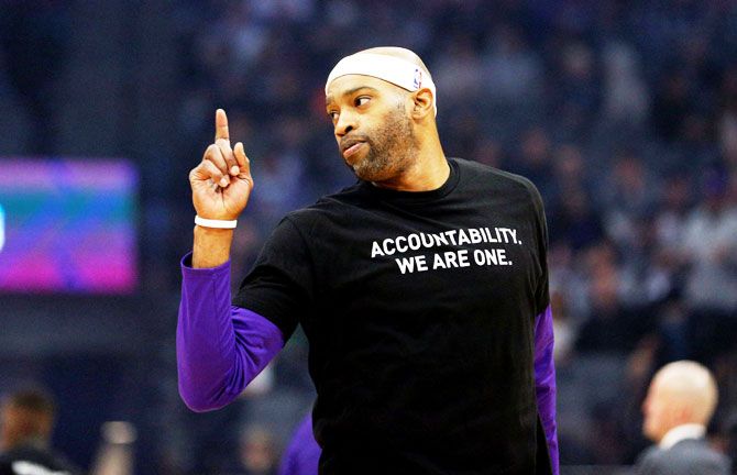 Sacramento Kings' forward Vince Carter (15) stands on the court before the start of the game against the Boston Celtics at Golden 1 Center. Players from both teams wore t-shirts during warmups in honor of Stephon Clark, a Sacramento native who was recently shot and killed by Sacramento police