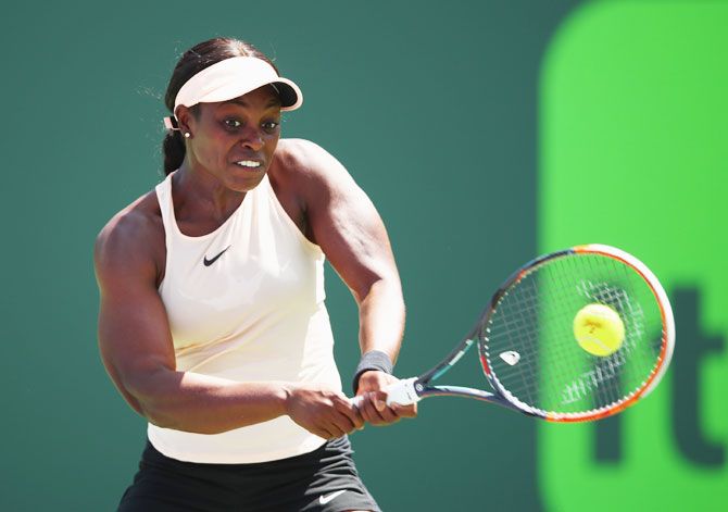USA's Sloane Stephens plays a backhand against Germany's Angelique Kerber in their fourth round match at Crandon Park Tennis Center