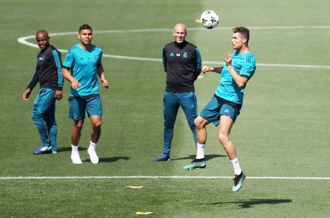 Real Madrid coach Zinedine Zidane, Cristiano Ronaldo and Casemiro during training