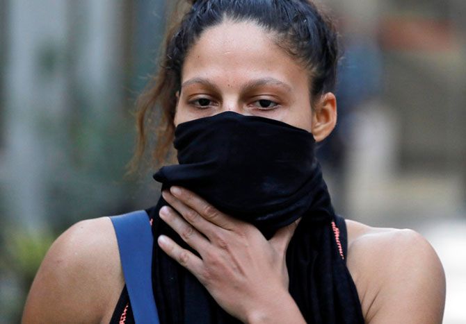Colombian boxer Dayana Cordero covers her face with a cloth after her practice session ahead of AIBA Women's World Boxing Championships at Indira Gandhi Indoor Stadium in New Delhi on Monday