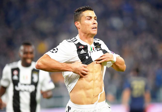 Juventus' Cristiano Ronaldo celebrates scoring the opening goal against Manchester United during their Champions League  Group H match at Allianz Stadium, in Turin on November 7