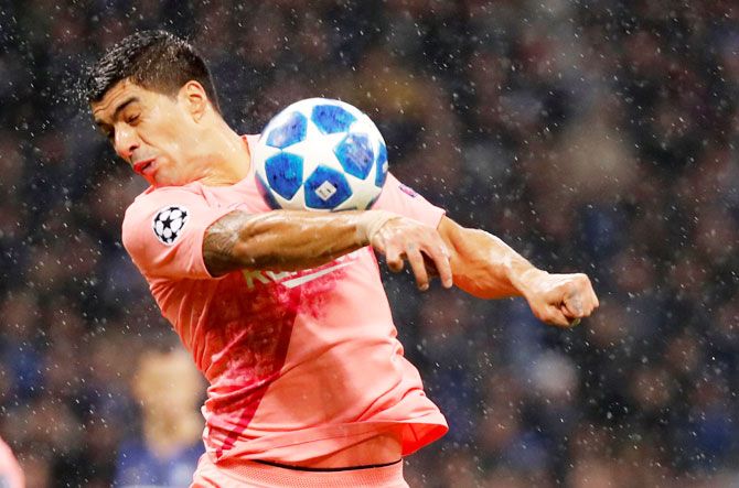 Barcelona's Luis Suarez takes evasive action during the Champions League Group B match against Inter Milan at San Siro in Milan on November 6