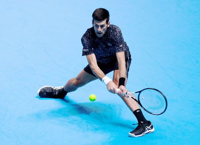 Serbia's Novak Djokovic in action during his ATP Finals group stage match against Germany's Alexander Zverev at the OZ Arena in London on Wednesday