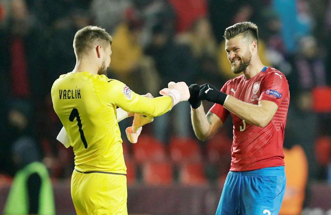 Czech Republic's Tomas Vaclik and Ondrej Celustka celebrates after the match