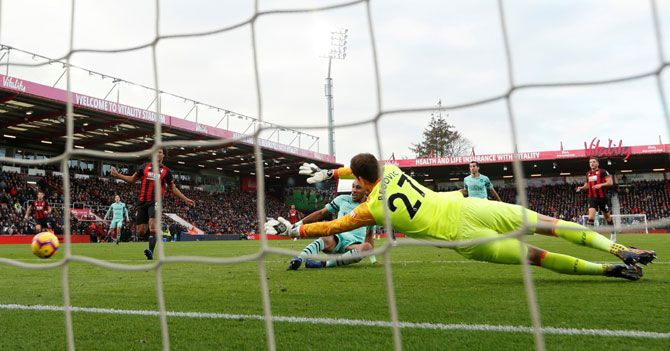 Arsenal's Pierre-Emerick Aubameyang scores their second goal against AFC Bournemouth on Sunday. Arsenal play a Europa League match during the week before facing Spurs on the weekend