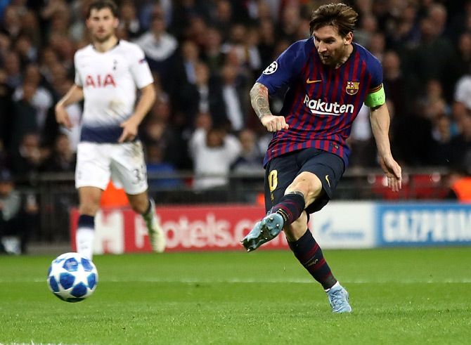 Barcelona's Lionel Messi scores the fourth goal against Tottenham
