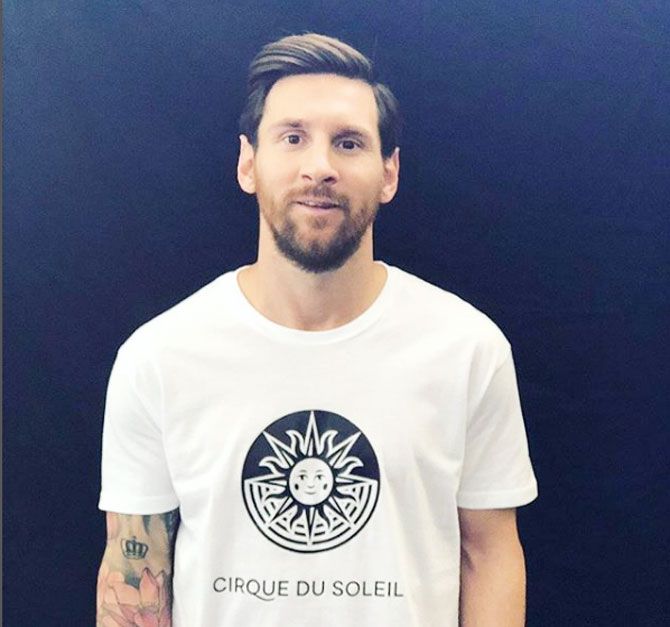 Lionel Messi dons a T-shirt to announce the show to be performed by Cirque du Soliel