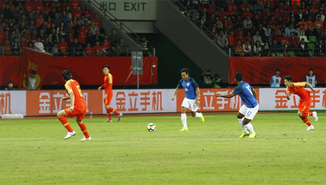 Action from the football friendly between China and India in Hong Kong on Saturday